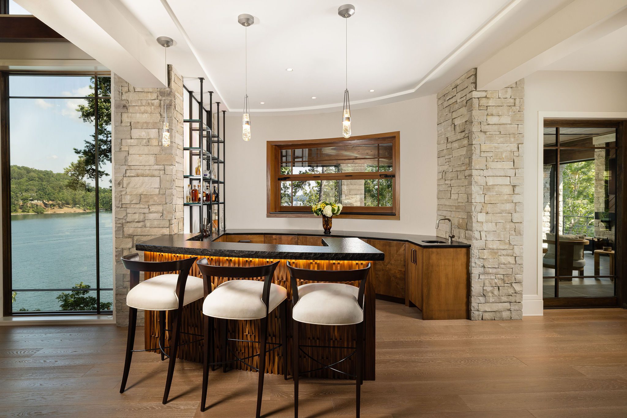 Daytime wet bar with stone accents by Gabriel Builders