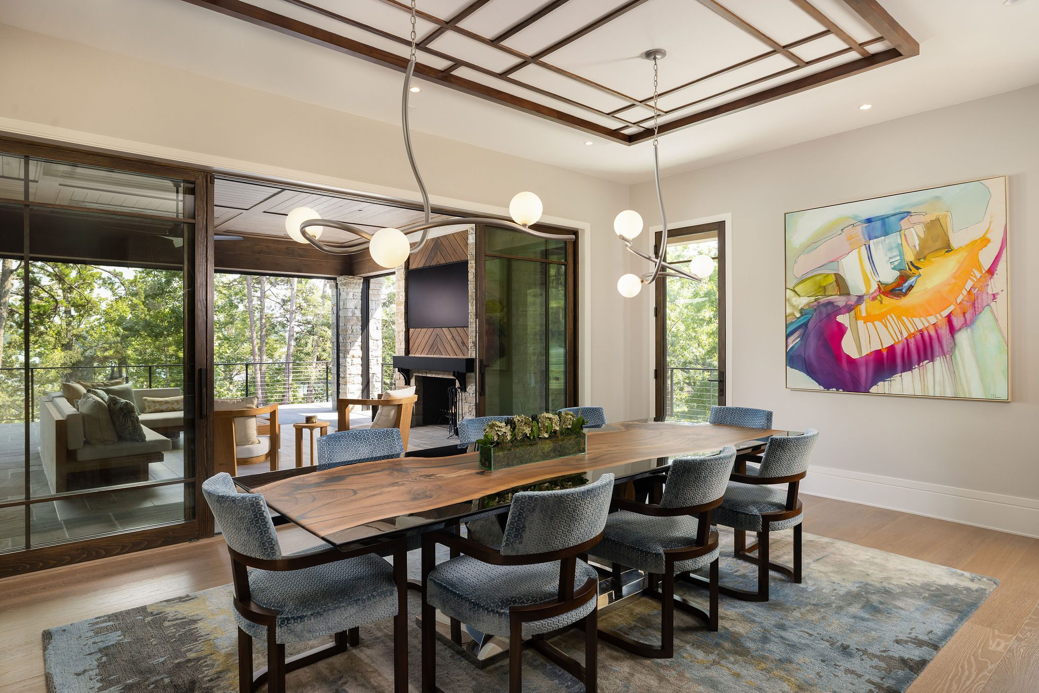 Luxury dining room with custom wood table by Gabriel Builders