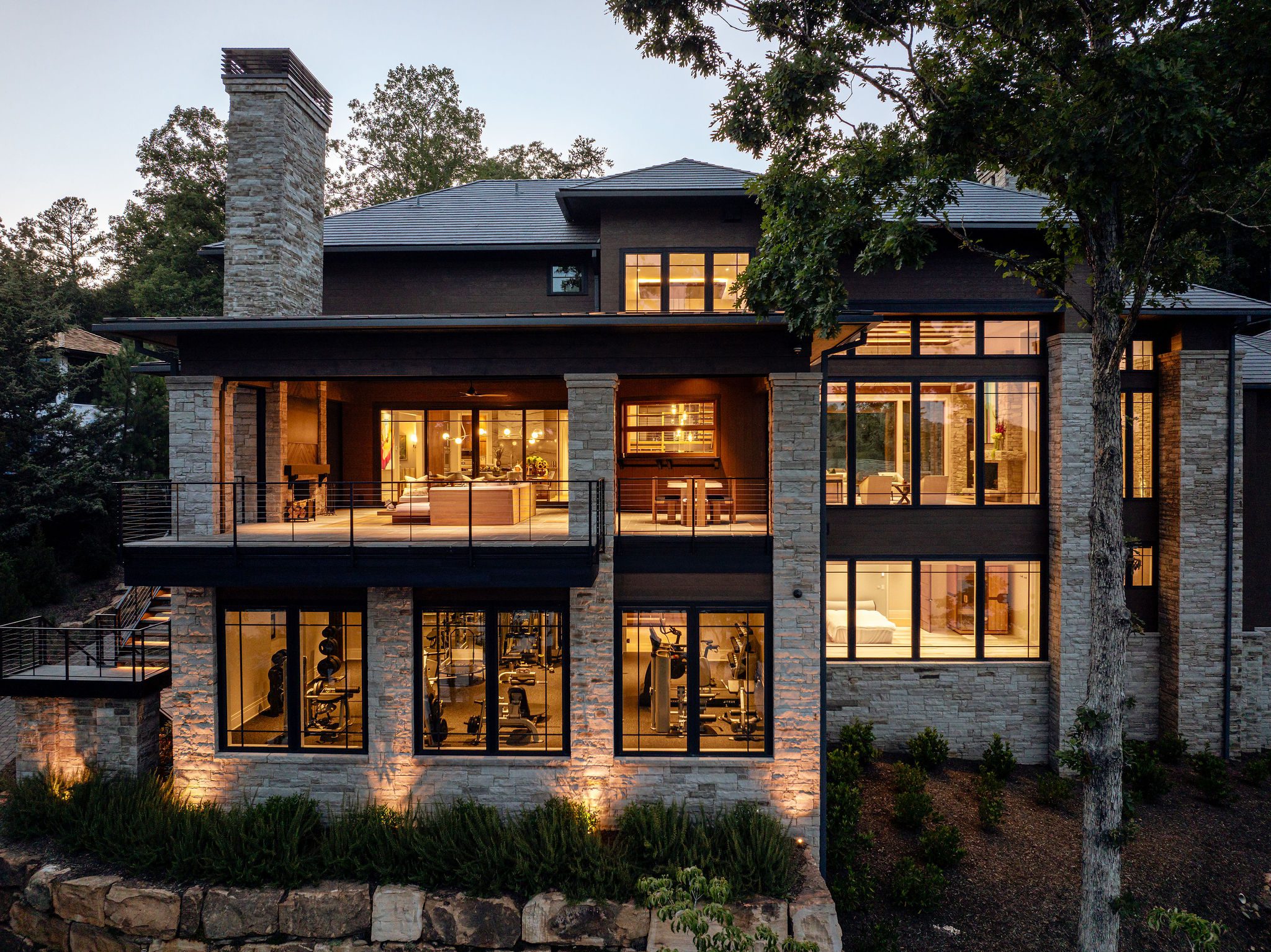 Gabriel Builders custom home at The Cliffs with evening lighting
