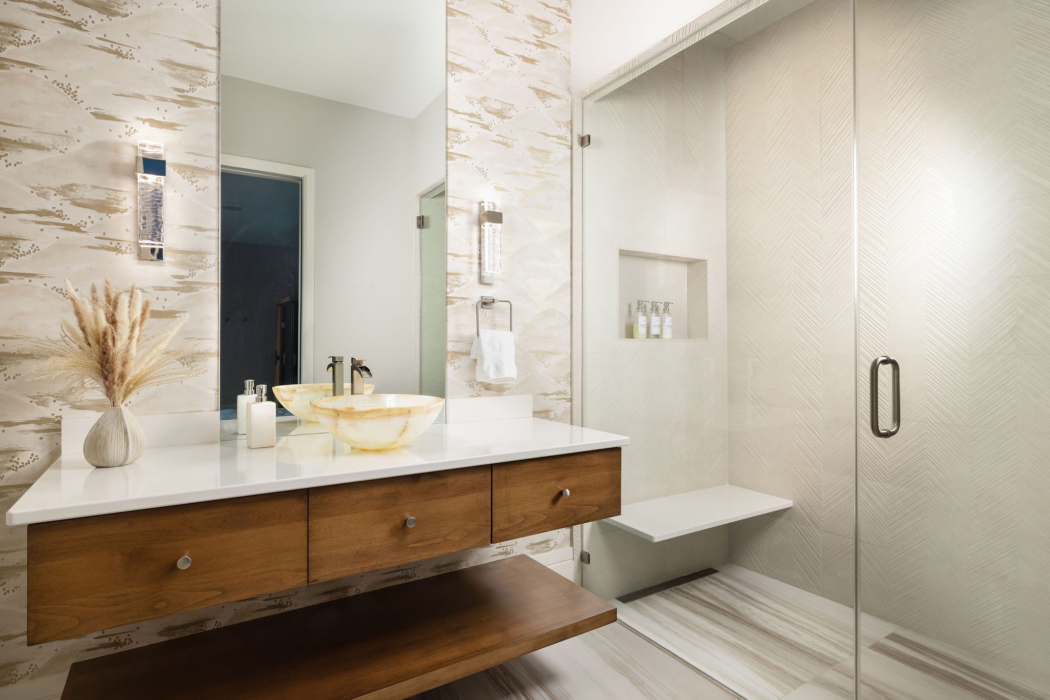 Spa bathroom with onyx vessel sink and walk-in shower Gabriel Builders