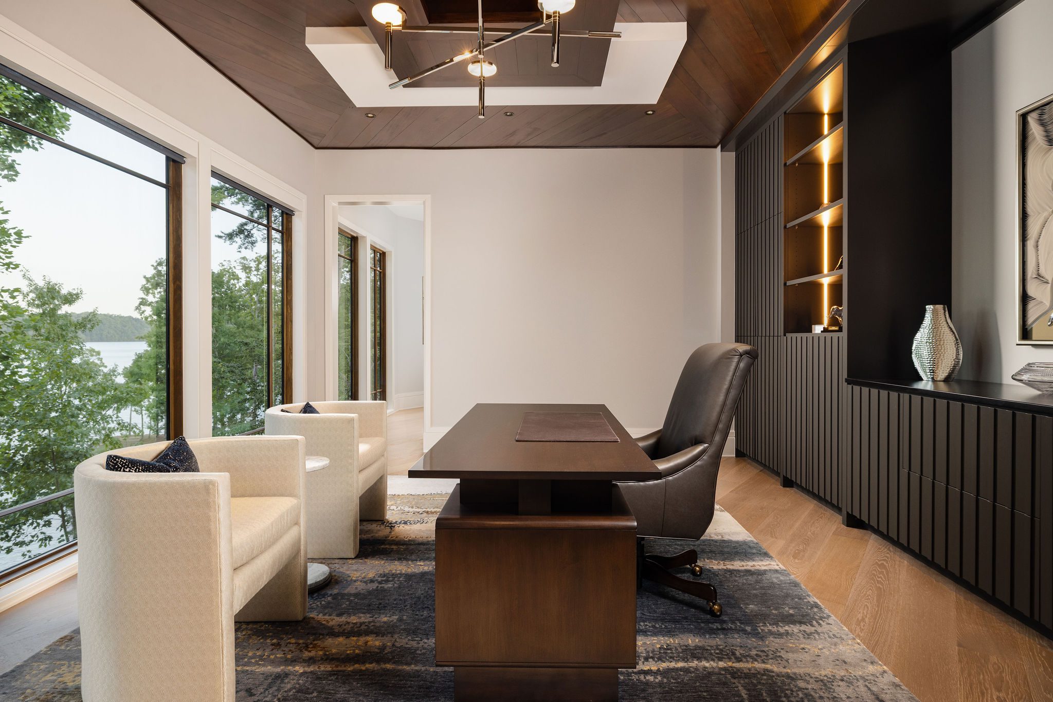 Luxury home office with lake views Gabriel Builders