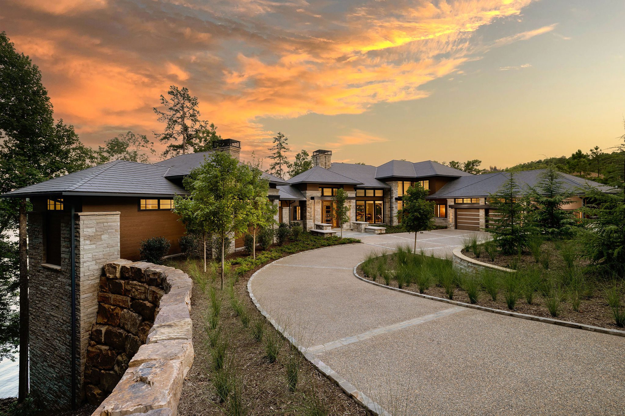 Gabriel Builders luxury home exterior at sunset Lake Keowee