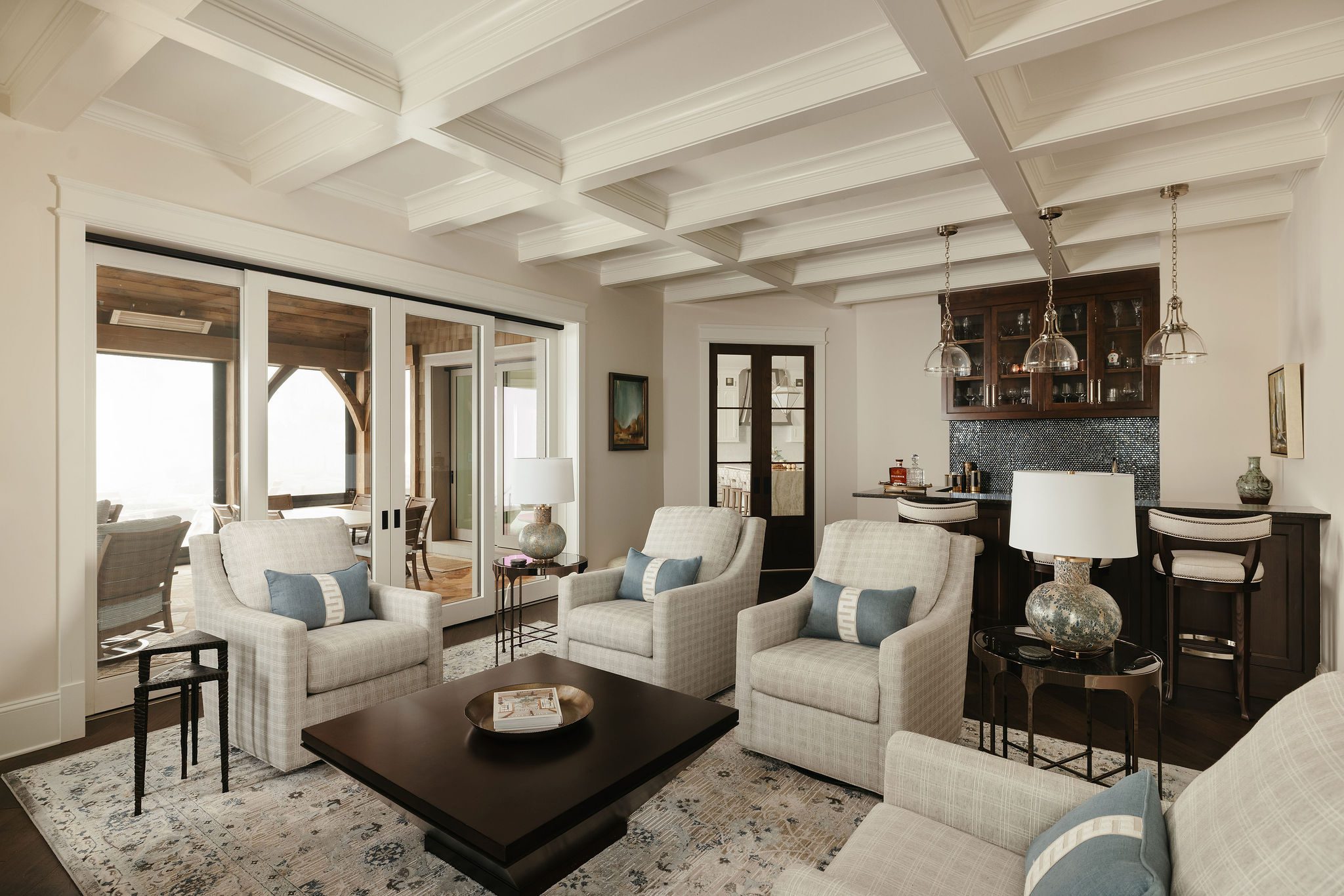 Cozy sitting room with tray ceilings.